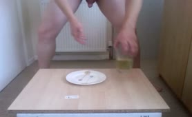 Eating shit from a white plate