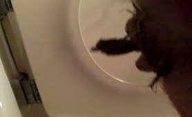 Very hairy man shitting in toilet