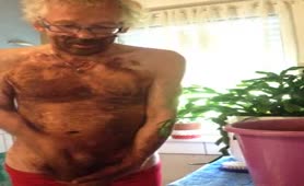 Old man jerking off hard with saved brown poop
