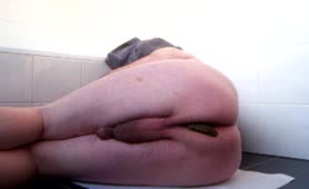 Teen boy pooping in spoon position
