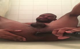 Black guy pooping after masturbating
