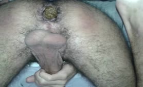 Masturbating slowly while shitting on his friend