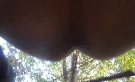 Amateur guy shitting in a forest