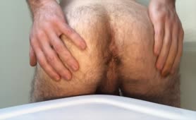 Hairy guy masturbating hard with poop