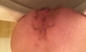 Hairy guy pooping in close up