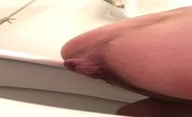 Chubby guy shitting in toilet